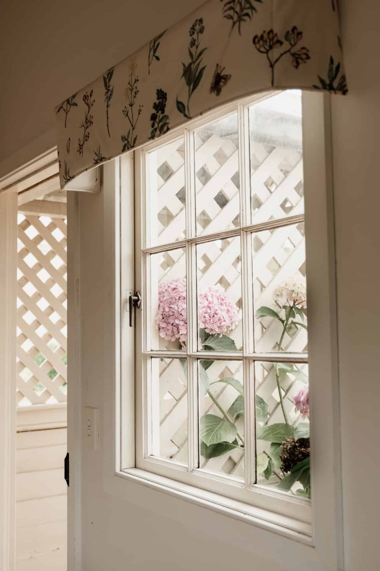 Lattice window with hydrangeas